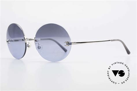 round sunglasses chanel|chanel rimless sunglasses.